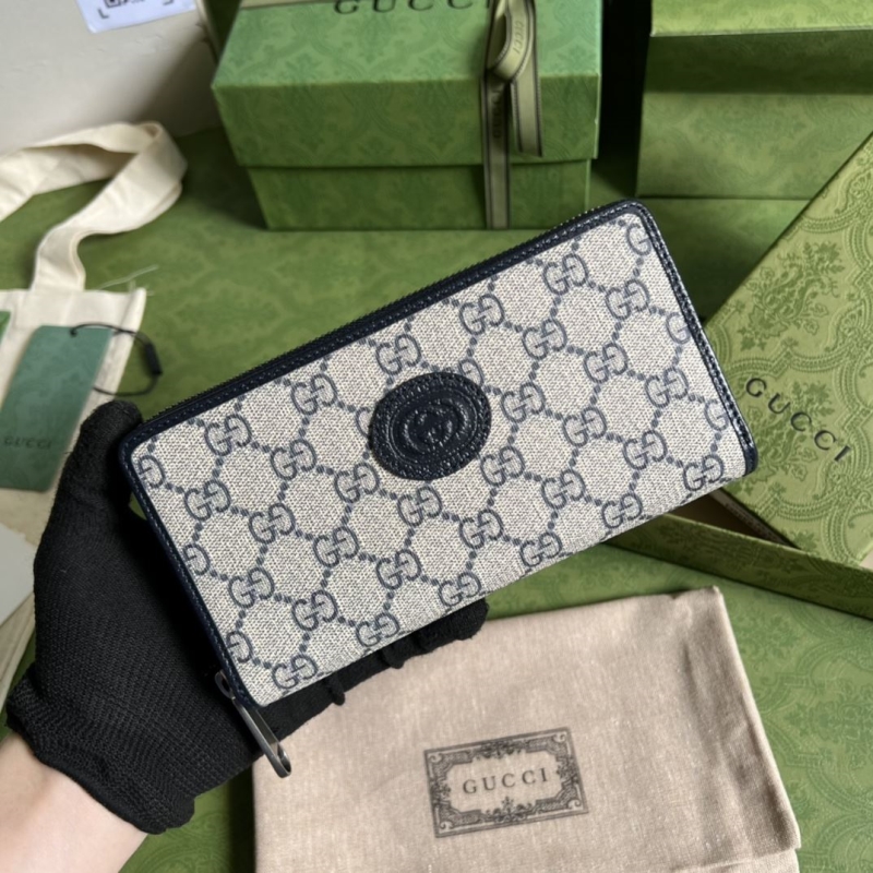 G*u*i clutch bags